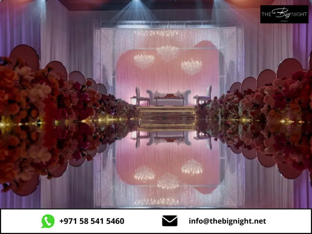 Luxury wedding stage with elegant floral arrangements and chandeliers, creating a romantic and sophisticated ambiance.