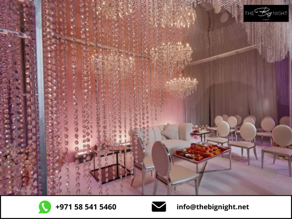 Luxurious event venue with elegant chandeliers, crystal decorations, and chic seating for a sophisticated gathering.